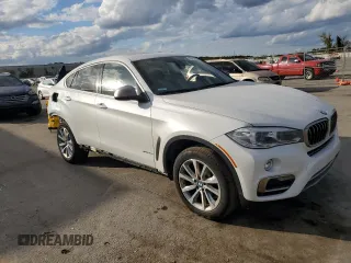 2018 BMW X6 xDrive35i with VIN 5UXKU2C52J0Z62235, listed as a Copart auction lot 76004803 with 72,379 mi miles. Bid and sale history available at carsss.com. Image 4.