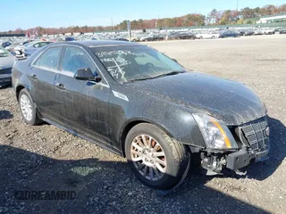 2010 Cadillac CTS with VIN 1G6DA5EG1A0142721, listed as a IAAI auction lot 40794805 with 50,656 mi miles and . Bid and sale history available at DreamBid. Image 1.