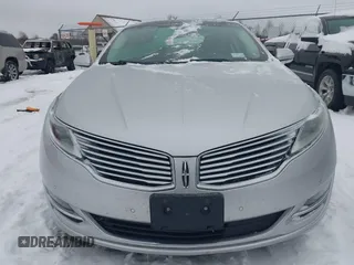2014 Lincoln MKZ z VIN 3LN6L2JK9ER813109, wystawiony jako IAAI lot #41444866 z przebiegiem 128 613 mil mil oraz . Historia ofert i sprzedaży dostępna na DreamBid. Obrazek 13.
