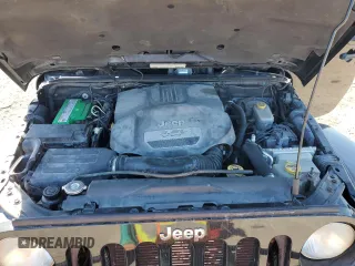 2012 Jeep Wrangler Sahara z VIN 1C4AJWBG1CL216425, wystawiony jako Copart lot #48377825 z przebiegiem 99 649 mil mil oraz Szkoda całkowita • Salvage title. Historia ofert i sprzedaży dostępna na DreamBid. Obrazek 11.
