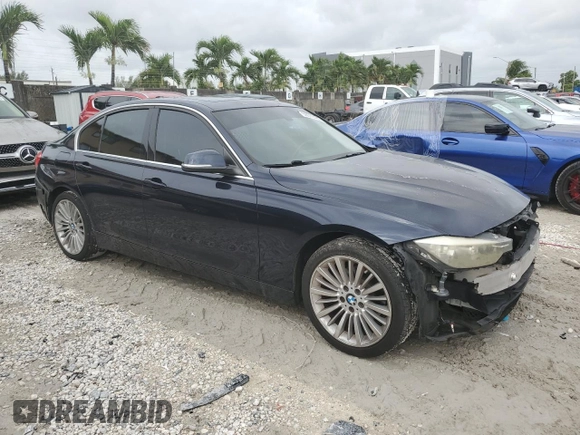 2012 BMW 3 Series 328i with VIN WBA3A5G51CNP17682, listed as a Copart auction lot 59619485 with 100,936 mi miles and Salvage title. Bid and sale history available at DreamBid. Image 4.