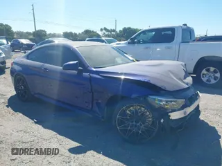 2020 BMW M4 with VIN WBS4Y9C09LFJ02627, listed as a IAAI auction lot 41785396 with 27,424 mi miles. Bid and sale history available at carsss.com. Image 1.