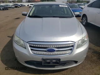2012 Ford Taurus SEL z VIN 1FAHP2HW4CG129105, wystawiony jako Copart lot #54708445 z przebiegiem 201 450 mil mil oraz Szkoda całkowita • Salvage title. Historia ofert i sprzedaży dostępna na DreamBid. Obrazek 5.
