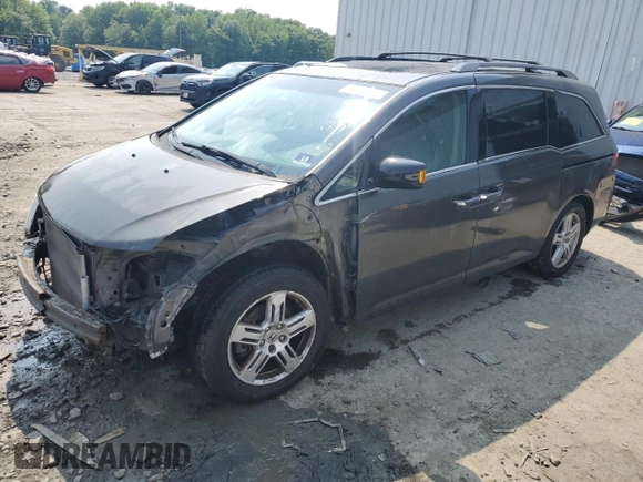 2013 Honda Odyssey Touring with VIN 5FNRL5H93DB017932, listed as a Copart auction lot 60112165 with 110,761 mi miles and Salvage title. Bid and sale history available at DreamBid. Image 1.