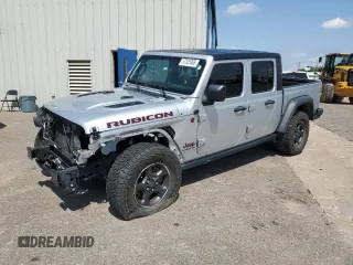 2022 Jeep Gladiator Rubicon z VIN 1C6JJTBG6NL104521, wystawiony jako Copart lot #57325365 z przebiegiem 31 498 mil mil oraz Szkoda całkowita • Salvage title. Historia ofert i sprzedaży dostępna na DreamBid. Obrazek 1.
