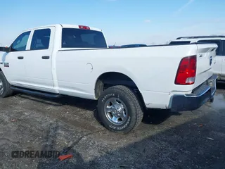 2013 Ram 2500 Tradesman z VIN 3C6TR5HT9DG575642, wystawiony jako IAAI lot #41557823 z przebiegiem 223 859 mil mil oraz . Historia ofert i sprzedaży dostępna na DreamBid. Obrazek 3.