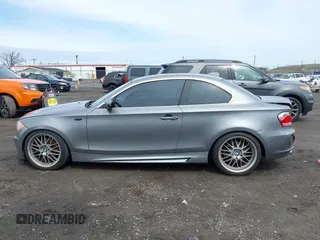 2011 BMW 1 Series 128i z VIN WBAUP9C52BVL89591, wystawiony jako IAAI lot #41951870 z przebiegiem 131 377 mil mil oraz . Historia ofert i sprzedaży dostępna na DreamBid. Obrazek 14.