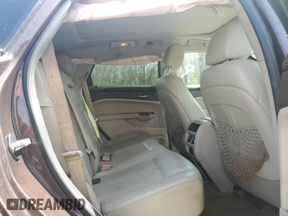 2015 Cadillac SRX Performance Collection z VIN 3GYFNCE30FS533686, wystawiony jako Copart lot #49820745 z przebiegiem 134 363 mil mil oraz Szkoda całkowita • Salvage title. Historia ofert i sprzedaży dostępna na DreamBid. Obrazek 11.