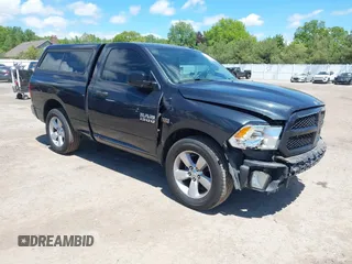 2014 Ram 1500 Express with VIN 3C6JR7AT9EG255106, listed as a IAAI auction lot 42319230 with 96,662 mi miles and . Bid and sale history available at DreamBid. Image 1.