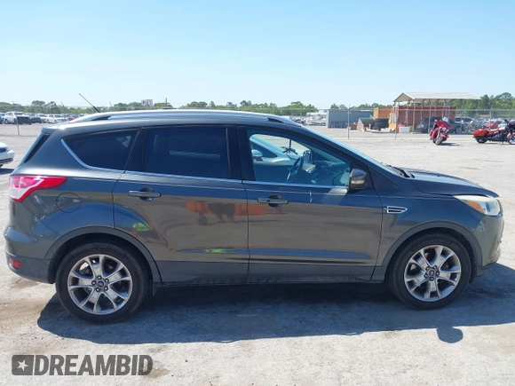 2016 Ford Escape Titanium with VIN 1FMCU0J95GUB11995, listed as a IAAI auction lot 42065255 with 142,390 mi miles. Bid and sale history available at carsss.com. Image 13.