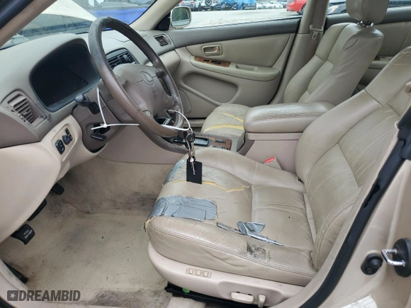 1997 Lexus ES 300 Luxury Sport Sdn with VIN JT8BF22G1V0024603, listed as a Copart auction lot 71528164 with 162,189 mi miles and Salvage Title. Bid and sale history available at carsss.com. Image 7.
