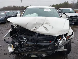 2015 Dodge Journey Crossroad with VIN 3C4PDCGG1FT548706, listed as a IAAI auction lot 41568038 with 142,435 mi miles and . Bid and sale history available at DreamBid. Image 13.