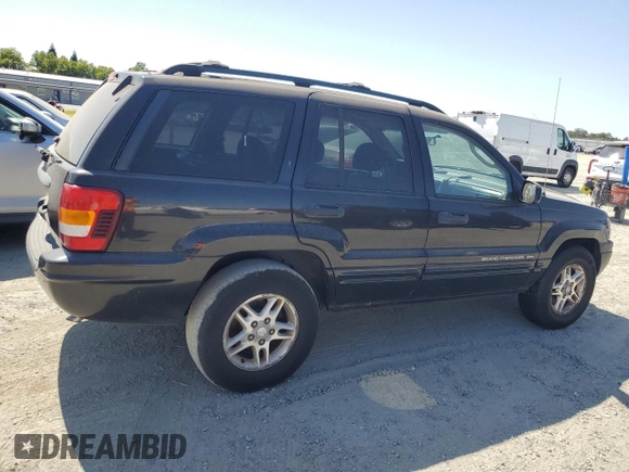 2004 Jeep Grand Cherokee Laredo with VIN 1J4GW48S84C182135, listed as a Copart auction lot 62224975 with 187,938 mi miles and Clean title. Bid and sale history available at DreamBid. Image 3.