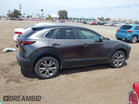 2021 Mazda CX-30 Select with VIN 3MVDMABL5MM210517, listed as a IAAI auction lot 42245033 with 191,303 mi miles and . Bid and sale history available at DreamBid. Image 13.