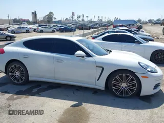 2015 Porsche Panamera 4 z VIN WP0AA2A72FL005751, wystawiony jako IAAI lot #37747010 z przebiegiem 68 128 mil mil oraz . Historia ofert i sprzedaży dostępna na DreamBid. Obrazek 13.