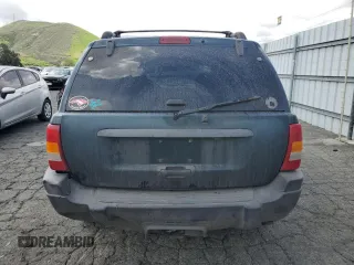 2004 Jeep Grand Cherokee Laredo with VIN 1J4GX48N94C397241, listed as a Copart auction lot 49183315 with 189,099 mi miles and Salvage title. Bid and sale history available at DreamBid. Image 6.