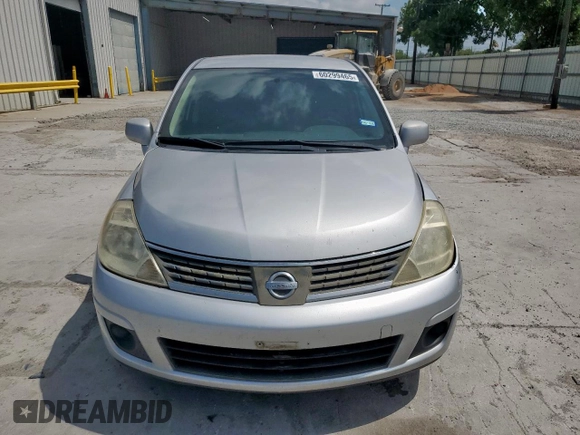 2009 Nissan Versa S with VIN 3N1BC11E39L376873, listed as a Copart auction lot 60299465 with 134,769 mi miles and Salvage title. Bid and sale history available at DreamBid. Image 5.