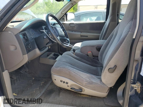 2003 Dodge Dakota SLT z VIN 1D7HL42N33S237980, wystawiony jako Copart lot #55276095 z przebiegiem 97 471 mil mil oraz Tytuł czysty. Historia ofert i sprzedaży dostępna na DreamBid. Obrazek 7.