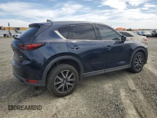 2017 Mazda CX-5 Grand Touring with VIN JM3KFADL2H0221149, listed as a Copart auction lot 50606915 with 140,518 mi miles and Clean Title. Bid and sale history available at carsss.com. Image 3.