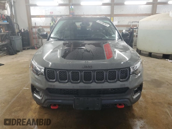 2023 Jeep Compass Trailhawk z VIN 3C4NJDDN9PT557910, wystawiony jako Copart lot #59387825 z przebiegiem 39 686 mil mil oraz Czysty tytuł • Clean title. Historia ofert i sprzedaży dostępna na DreamBid. Obrazek 5.