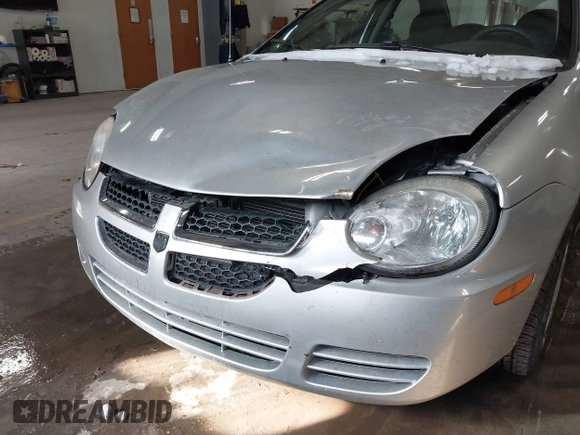 2004 Dodge Neon SXT with VIN 1B3ES56C94D593209, listed as a IAAI auction lot 41621999 with 89,698 mi miles. Bid and sale history available at carsss.com. Image 11.