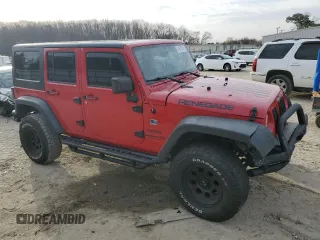 2014 Jeep Wrangler Unlimited Sport with VIN 1C4HJWDG6EL280653, listed as a Copart auction lot 48851205 with 125,211 mi miles and Salvage Title. Bid and sale history available at DreamBid. Image 4.