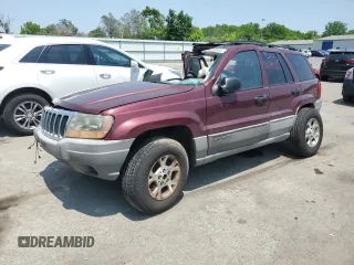 1999 Jeep Grand Cherokee Laredo with VIN 1J4GW58S7XC570998, listed as a Copart auction lot 59699665 with Not provided miles and Salvage title. Bid and sale history available at DreamBid. Image 1.