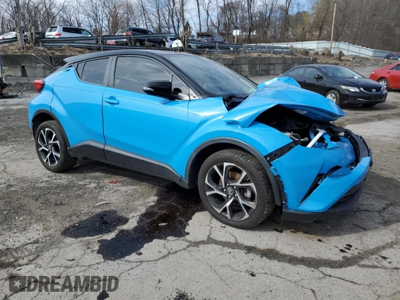 2019 Toyota C-HR XLE with VIN NMTKHMBX4KR097964, listed as a Copart auction lot 50431145 with 0 mi miles and Salvage Title. Bid and sale history available at carsss.com. Image 4.