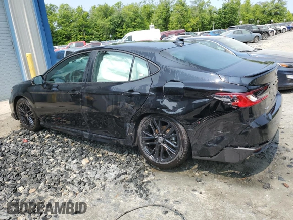 2025 Toyota Camry LE z VIN 4T1DAACKXSU089259, wystawiony jako Copart lot #59180765 z przebiegiem 9 242 mil mil oraz Czysty tytuł • Clean title. Historia ofert i sprzedaży dostępna na DreamBid. Obrazek 2.