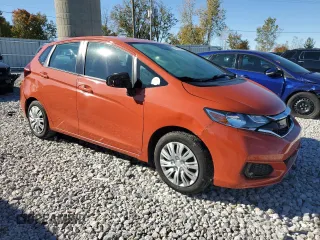 2018 Honda Fit LX with VIN 3HGGK5G44JM718570, listed as a Copart auction lot 74830344 with 158,523 mi miles and Salvage Title. Bid and sale history available at DreamBid. Image 4.