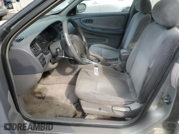 1999 Nissan Altima XE z VIN 1N4DL01D1XC202466, wystawiony jako Copart lot #54548015 z przebiegiem 131 409 mil mil oraz Szkoda całkowita • Salvage title. Historia ofert i sprzedaży dostępna na DreamBid. Obrazek 7.