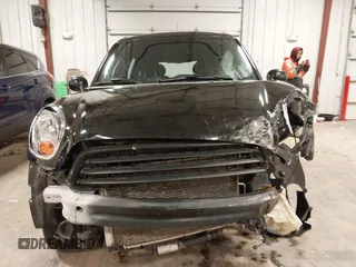 2012 MINI Countryman with VIN WMWZB3C53CWM05133, listed as a IAAI auction lot 41493309 with 114,412 mi miles and . Bid and sale history available at DreamBid. Image 13.