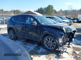 2020 Mazda CX-5 Grand Touring with VIN JM3KFBDM7L1807685, listed as a IAAI auction lot 41392313 with 91,729 mi miles and . Bid and sale history available at carsss.com. Image 13.