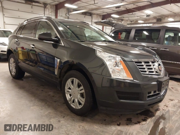 2014 Cadillac SRX with VIN 3GYFNAE34ES665630, listed as a IAAI auction lot 41315281 with 99,009 mi miles and . Bid and sale history available at DreamBid. Image 1.