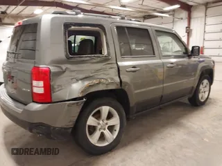 2014 Jeep Patriot Limited with VIN 1C4NJRCBXED546471, listed as a IAAI auction lot 41744915 with 113,691 mi miles and . Bid and sale history available at DreamBid. Image 4.