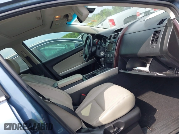 2014 Mazda CX-9 Grand Touring with VIN JM3TB2DA7E0427423, listed as a IAAI auction lot 42006817 with 95,248 mi miles and . Bid and sale history available at DreamBid. Image 5.
