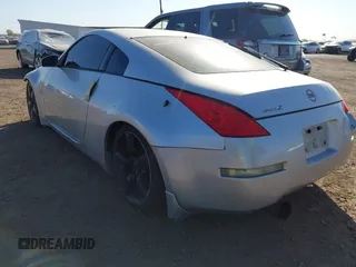 2006 Nissan 350Z with VIN JN1AZ34D56M306544, listed as a IAAI auction lot 42000765 with 150,126 mi miles. Bid and sale history available at carsss.com. Image 3.