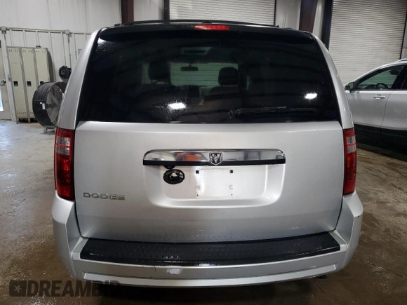 2010 Dodge Grand Caravan SXT with VIN 2D4RN5D1XAR268976, listed as a Copart auction lot 54587505 with 179,000 mi miles and Salvage Title. Bid and sale history available at DreamBid. Image 6.