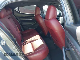 2023 Mazda 3 S Carbon Edition with VIN JM1BPBLM8P1611106, listed as a IAAI auction lot 42191902 with 37,244 mi miles and . Bid and sale history available at DreamBid. Image 8.