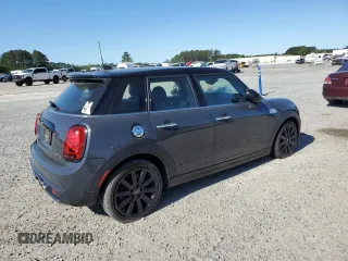2020 MINI Hardtop 4 Door Cooper S z VIN WMWXU9C02L2M29164, wystawiony jako Copart lot #53538275 z przebiegiem 60 076 mil mil oraz Szkody całkowita. Historia ofert i sprzedaży dostępna na DreamBid. Obrazek 3.