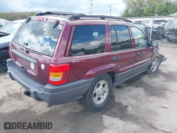 2001 Jeep Grand Cherokee Laredo with VIN 1J4GW48S91C588162, listed as a IAAI auction lot 42176476 with Not provided miles and . Bid and sale history available at DreamBid. Image 4.
