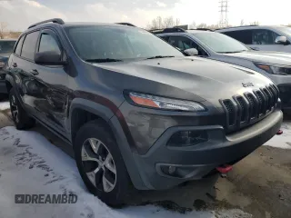 2014 Jeep Cherokee Trailhawk with VIN 1C4PJMBB2EW137916, listed as a Copart auction lot 44961445 with 119,145 mi miles and Salvage Title. Bid and sale history available at carsss.com. Image 4.
