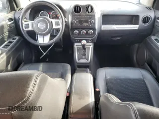 2017 Jeep Compass High Altitude with VIN 1C4NJCEBXHD163029, listed as a Copart auction lot 49732545 with 99,368 mi miles and Salvage Title. Bid and sale history available at carsss.com. Image 8.