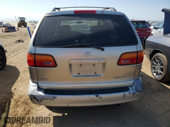 2000 Toyota Sienna LE with VIN 4T3ZF13C3YU229328, listed as a Copart auction lot 70880244 with 201,464 mi miles and Salvage Title. Bid and sale history available at carsss.com. Image 6.