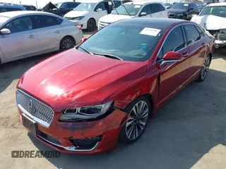2019 Lincoln MKZ Hybrid Reserve II with VIN 3LN6L5MU7KR617325, listed as a IAAI auction lot 42584481 with 76,118 mi miles and . Bid and sale history available at DreamBid. Image 2.