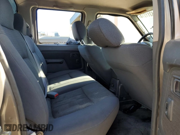 2004 Nissan Frontier XE z VIN 1N6ED27T94C461253, wystawiony jako Copart lot #86311014 z przebiegiem 174 836 mil mil oraz Szkoda całkowita • Salvage title. Historia ofert i sprzedaży dostępna na DreamBid. Obrazek 10.
