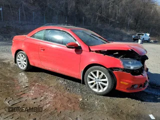 2015 Volkswagen Eos Komfort with VIN WVWBW8AH5FV004387, listed as a Copart auction lot 51046755 with 67,466 mi miles and Salvage Title. Bid and sale history available at DreamBid. Image 4.