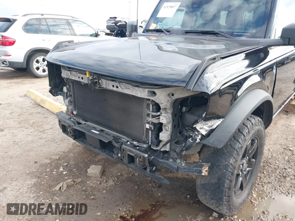 2023 Ford Bronco z VIN 1FMDE5BHOPLB83665, wystawiony jako IAAI lot #41520897 z przebiegiem 16 678 mil mil oraz . Historia ofert i sprzedaży dostępna na DreamBid. Obrazek 6.
