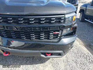 2021 Chevrolet Silverado 1500 Custom Trail Boss with VIN 1GCPYCEHXMZ305434, listed as a IAAI auction lot 41821014 with 56,356 mi miles. Bid and sale history available at carsss.com. Image 6.