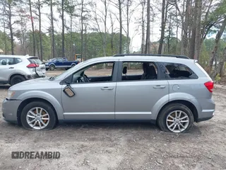 2015 Dodge Journey SXT with VIN 3C4PDCBG5FT696882, listed as a IAAI auction lot 41848362 with 175,039 mi miles and . Bid and sale history available at DreamBid. Image 14.